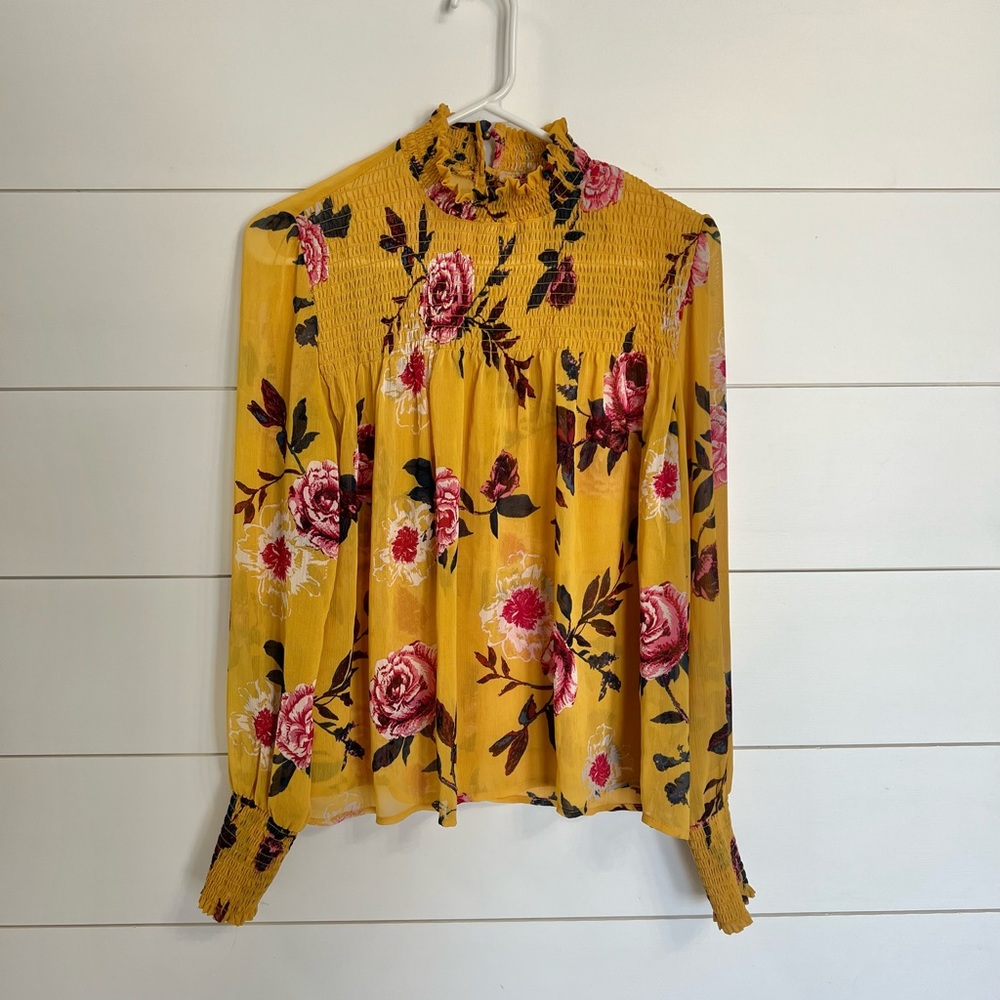 Women’s Beautiful Sheer Blouse with Flowers size Medium.